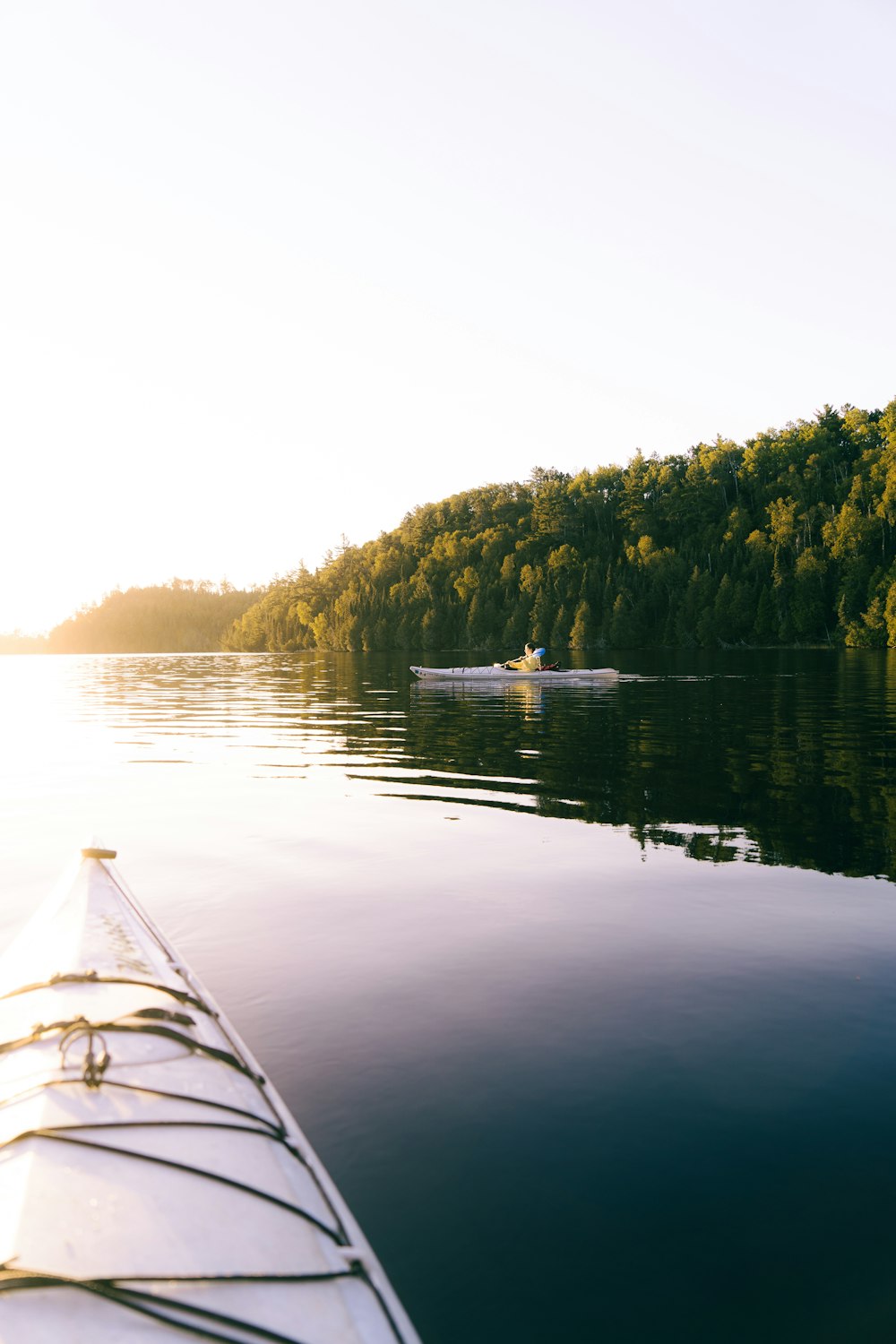 a view of a lake with a boat in the water