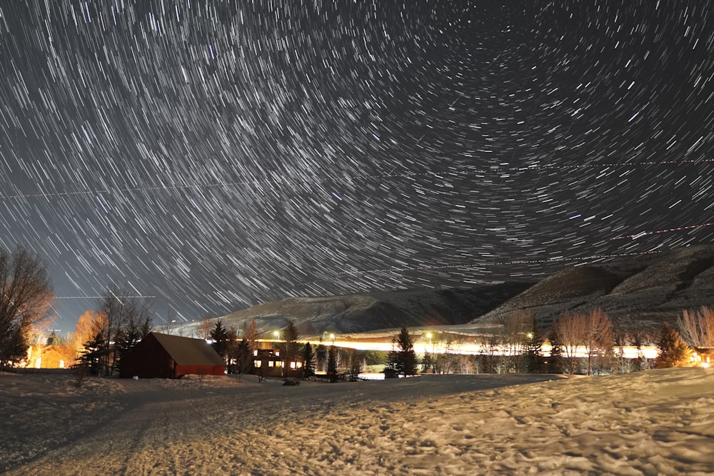 the night sky is full of star trails