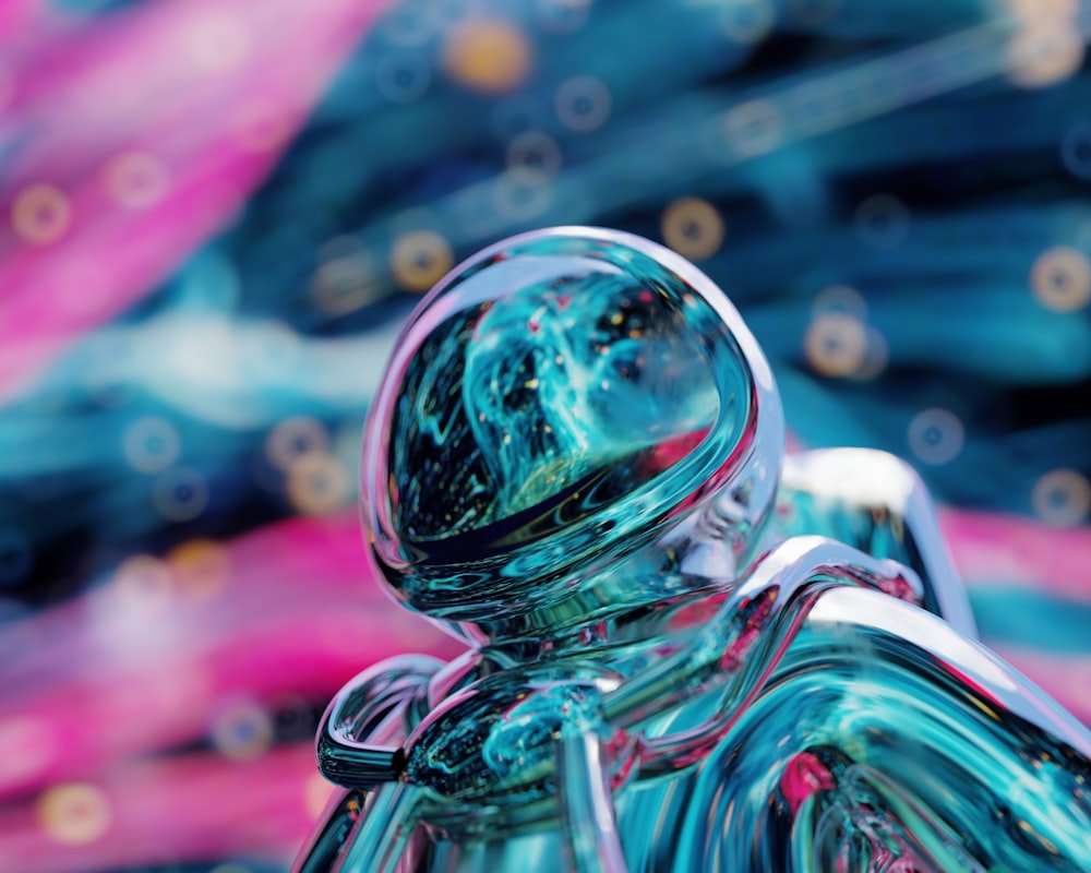a close up of a colorful glass figure