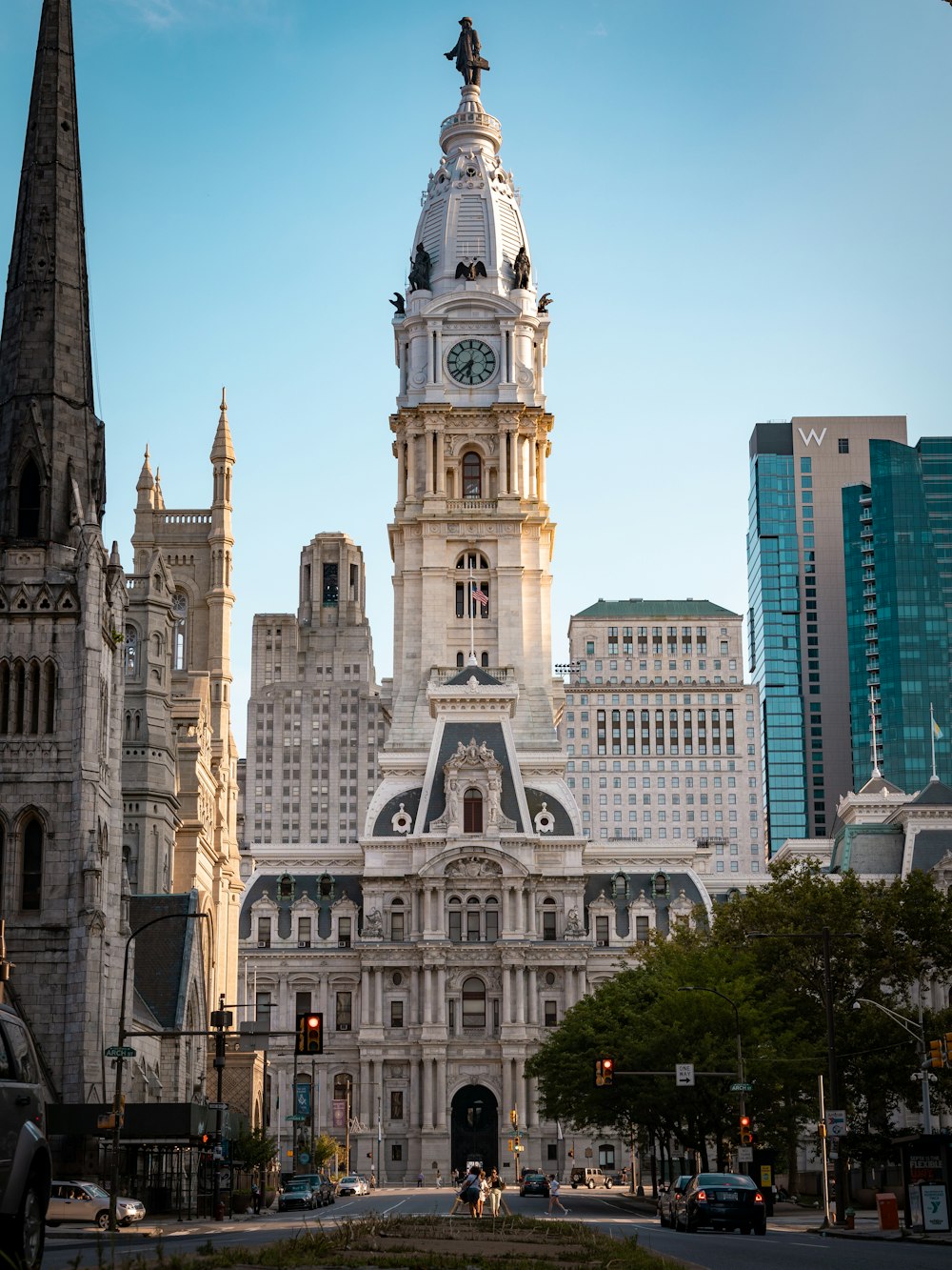 a large clock tower towering over Philadelphia City Hall