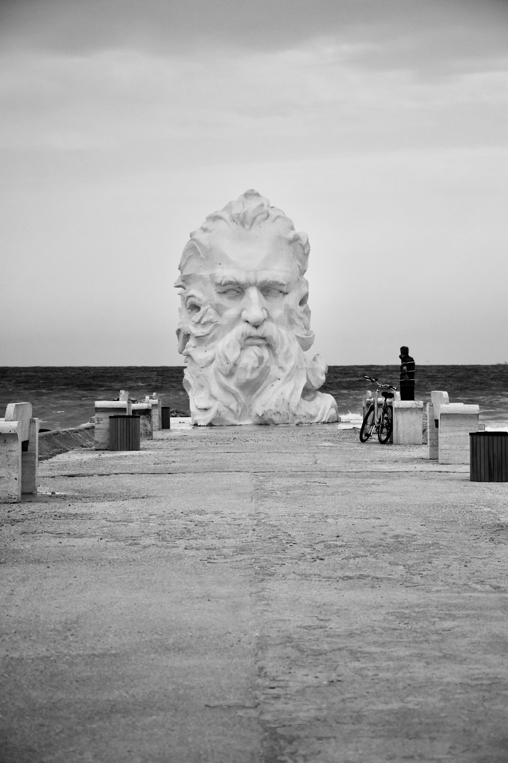 a statue of a man with a beard and a beard