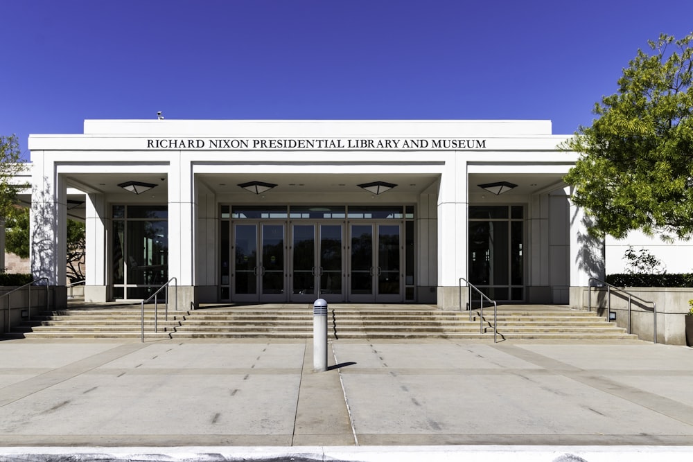 a large white building with steps leading up to it