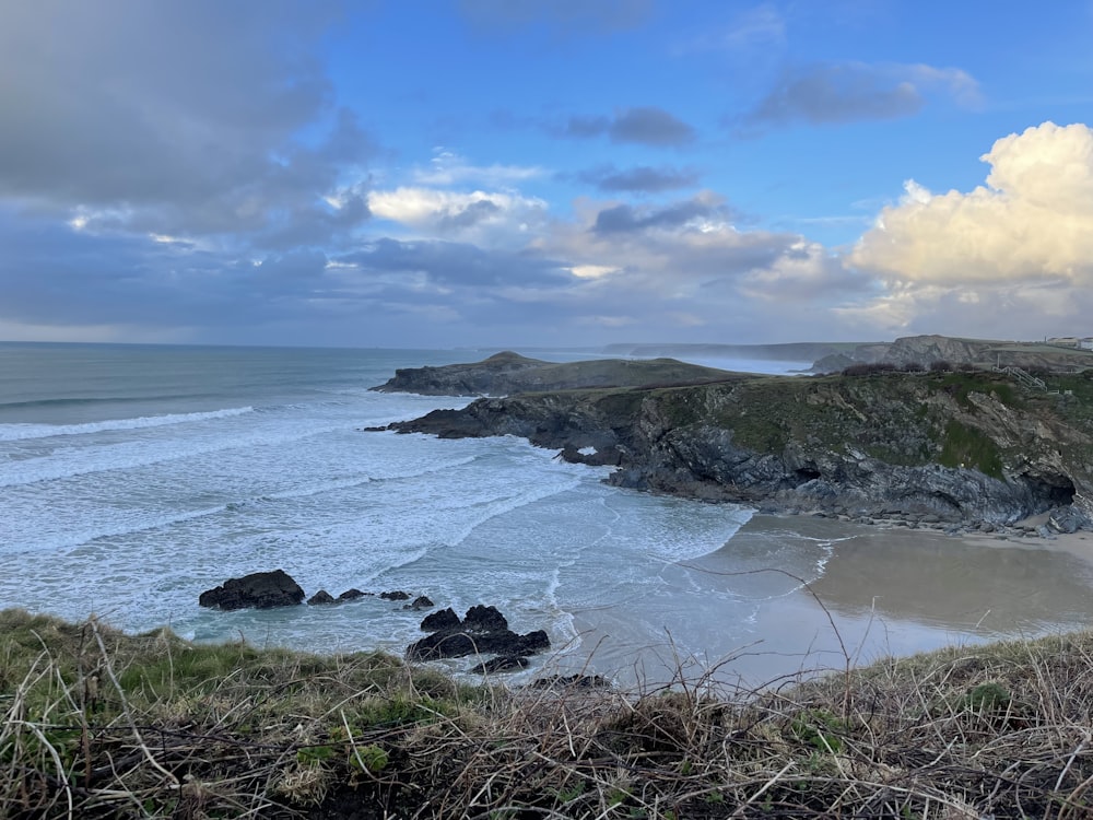 a view of the ocean from a hill