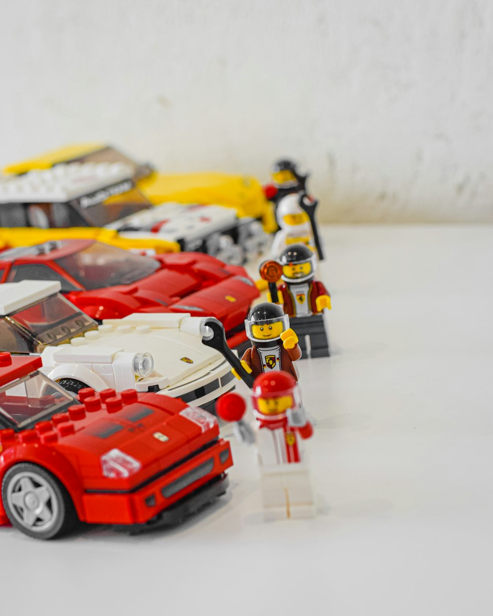 a group of toy cars sitting next to each other