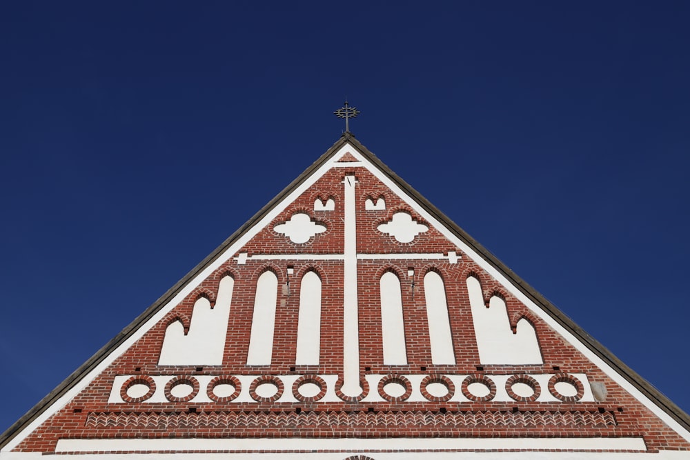 a church steeple with a cross on top