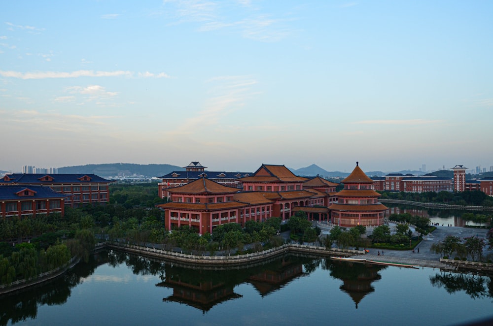 a large body of water next to a large building