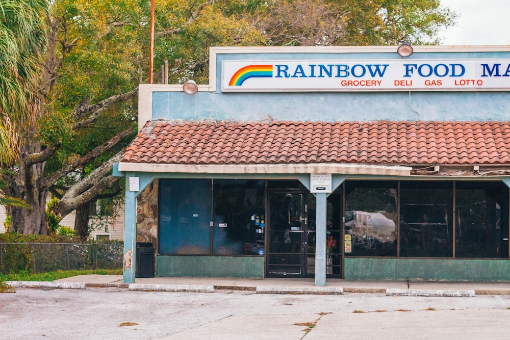 a rainbow food market on a street corner