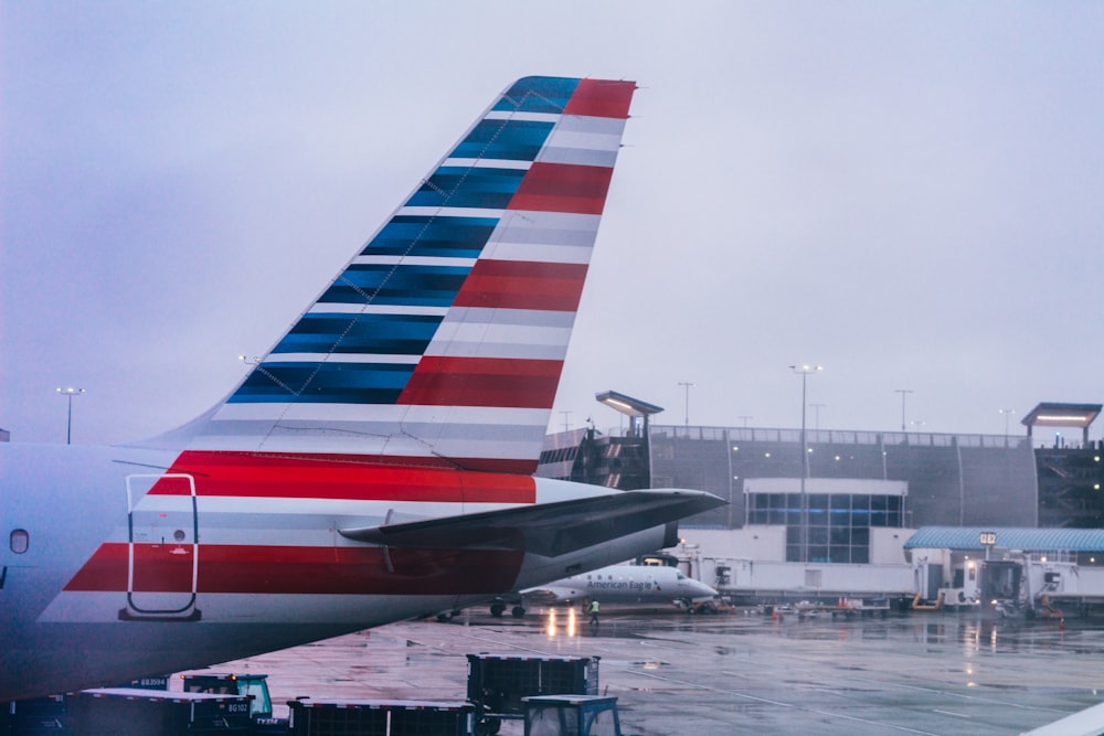 a large jetliner sitting on top of an airport tarmac