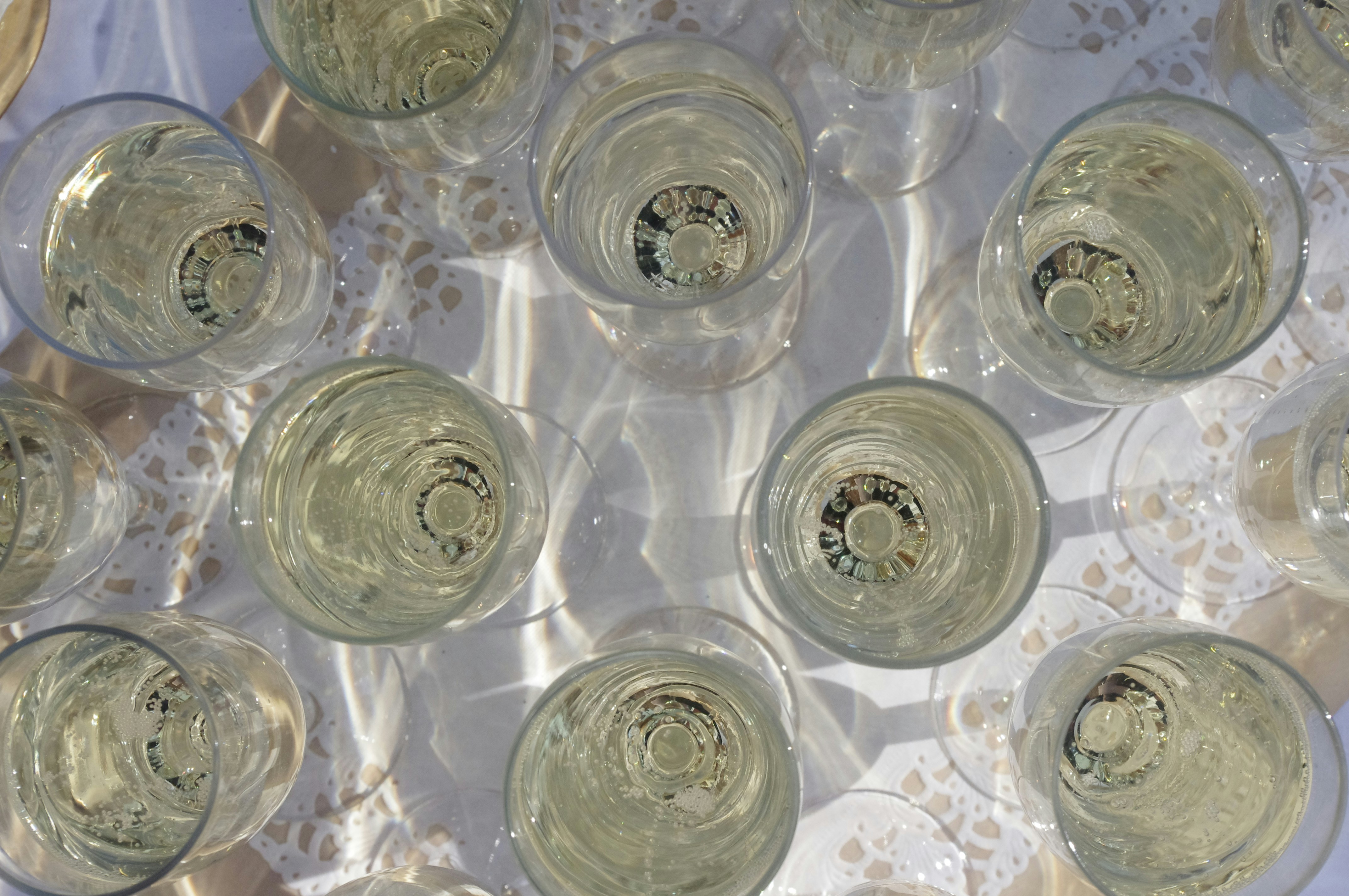 a group of wine glasses sitting on top of a table