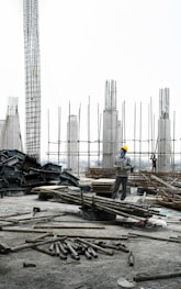 a man standing on top of a construction site