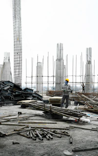 a man standing on top of a construction site