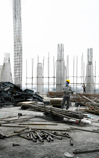 a man standing on top of a construction site