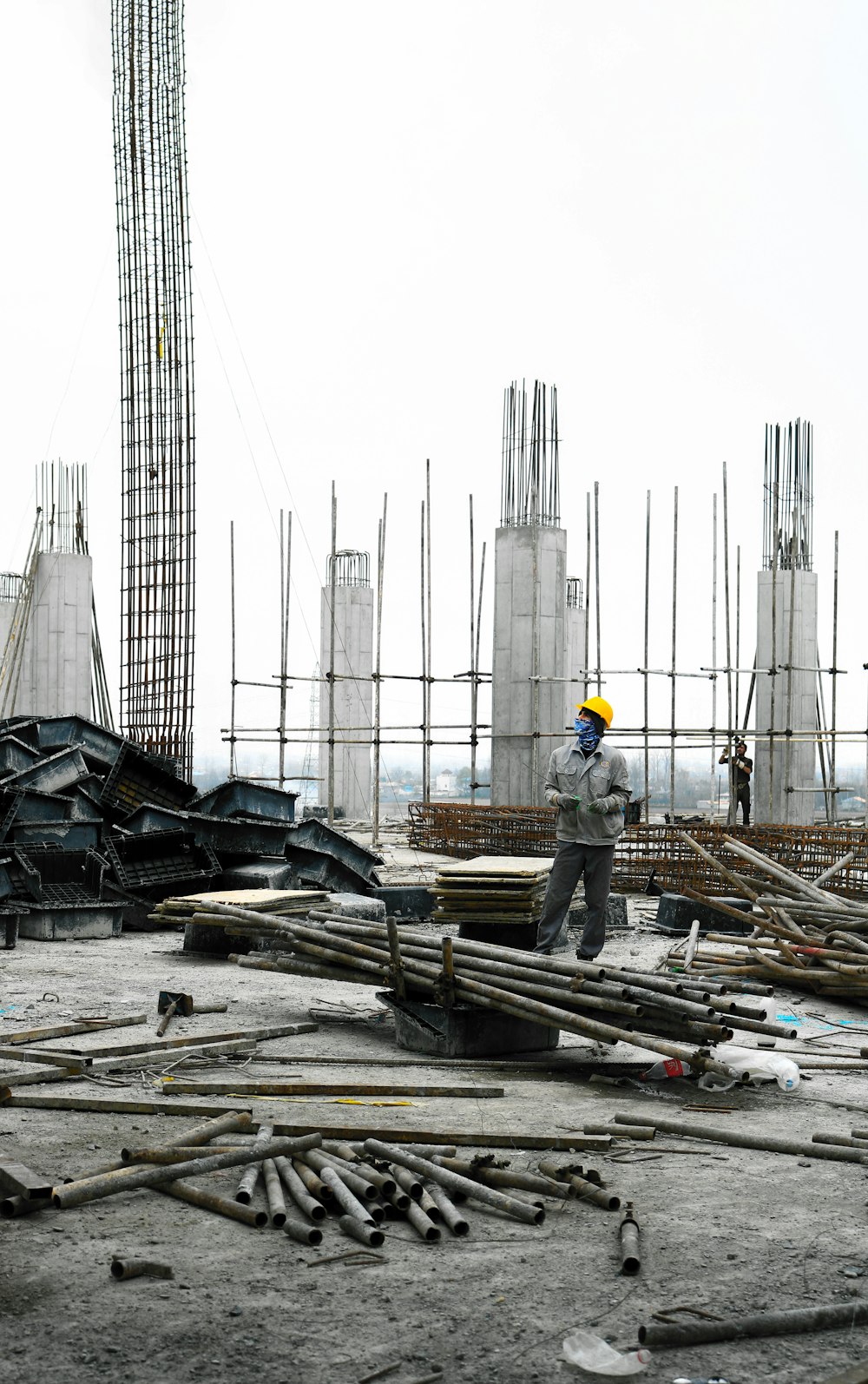 a man standing on top of a construction site