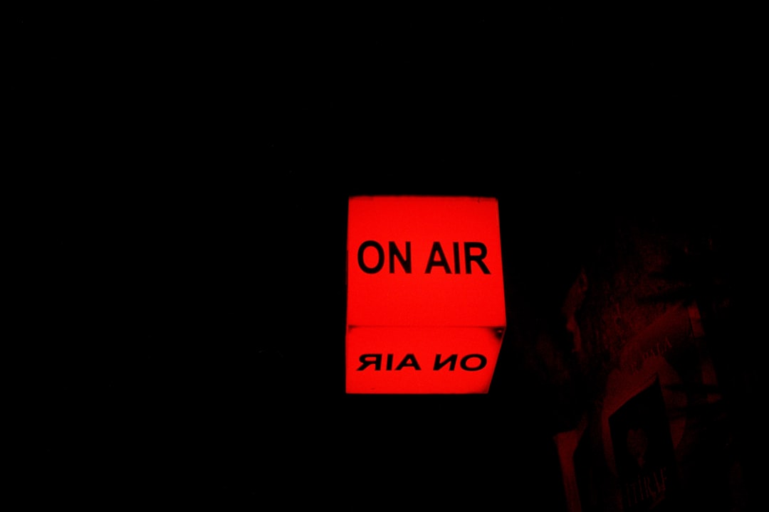 10 ways to promote your music without a label: a red sign that says on air on a black background