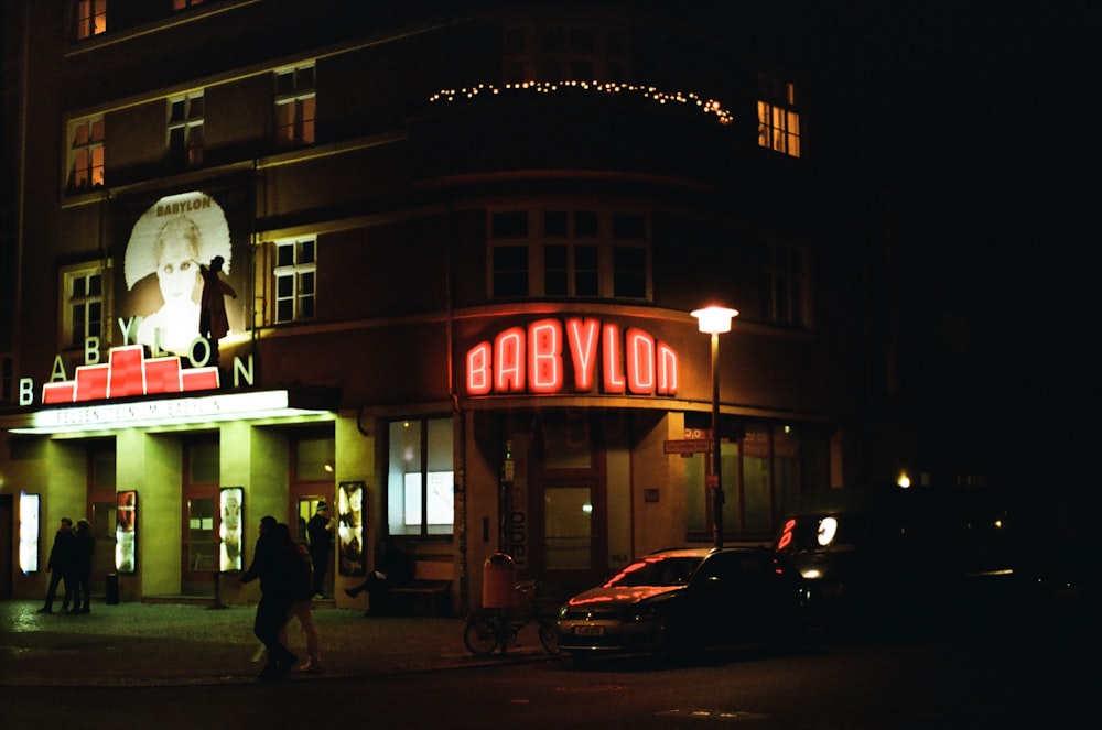 a building that has a neon sign on it