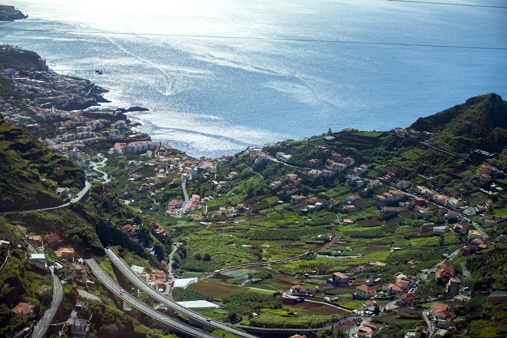 an aerial view of a town on the coast