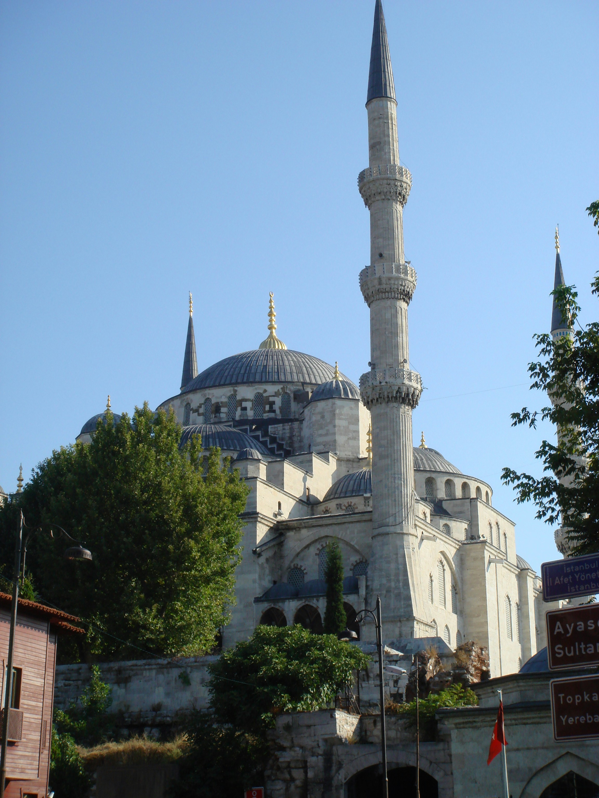 a large white building with a very tall tower