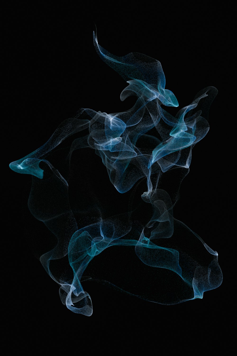 a black background with blue smoke in the air