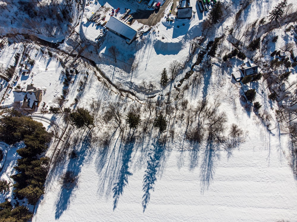 an aerial view of a ski resort in the snow