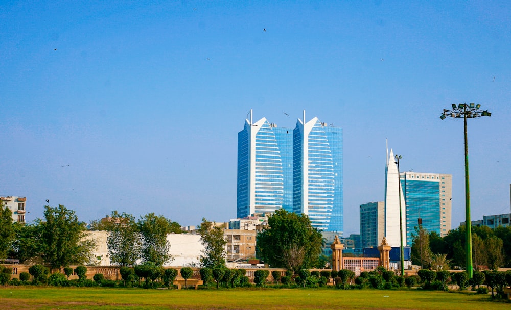 a view of a city with tall buildings in the background