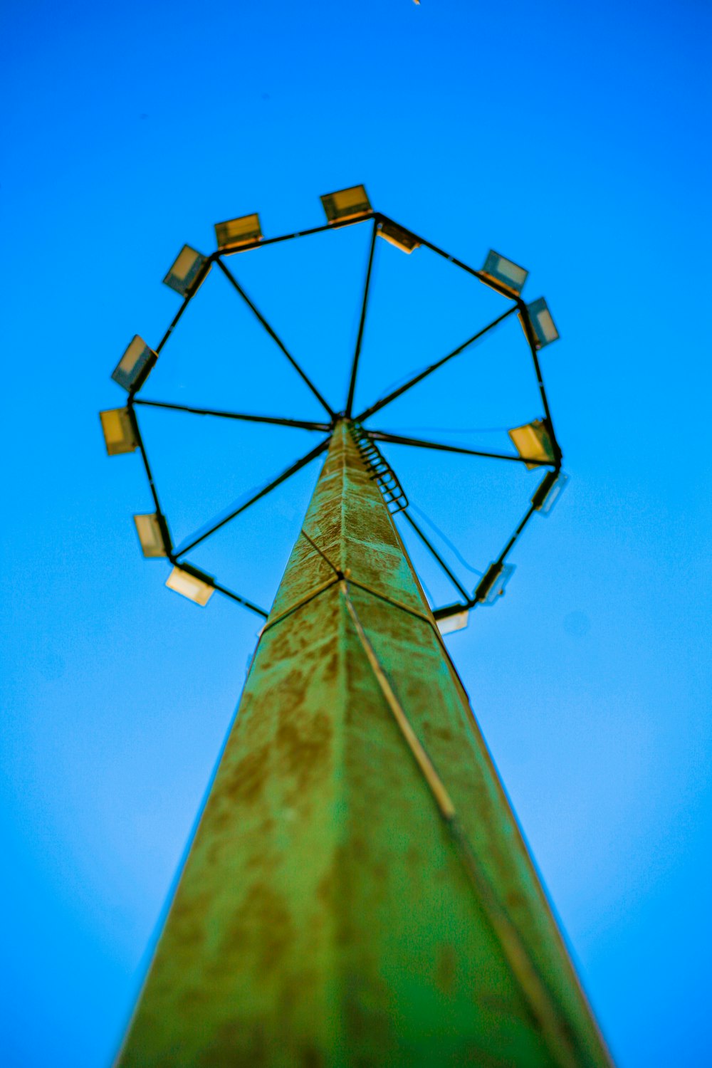 a ferris wheel on top of a tall building