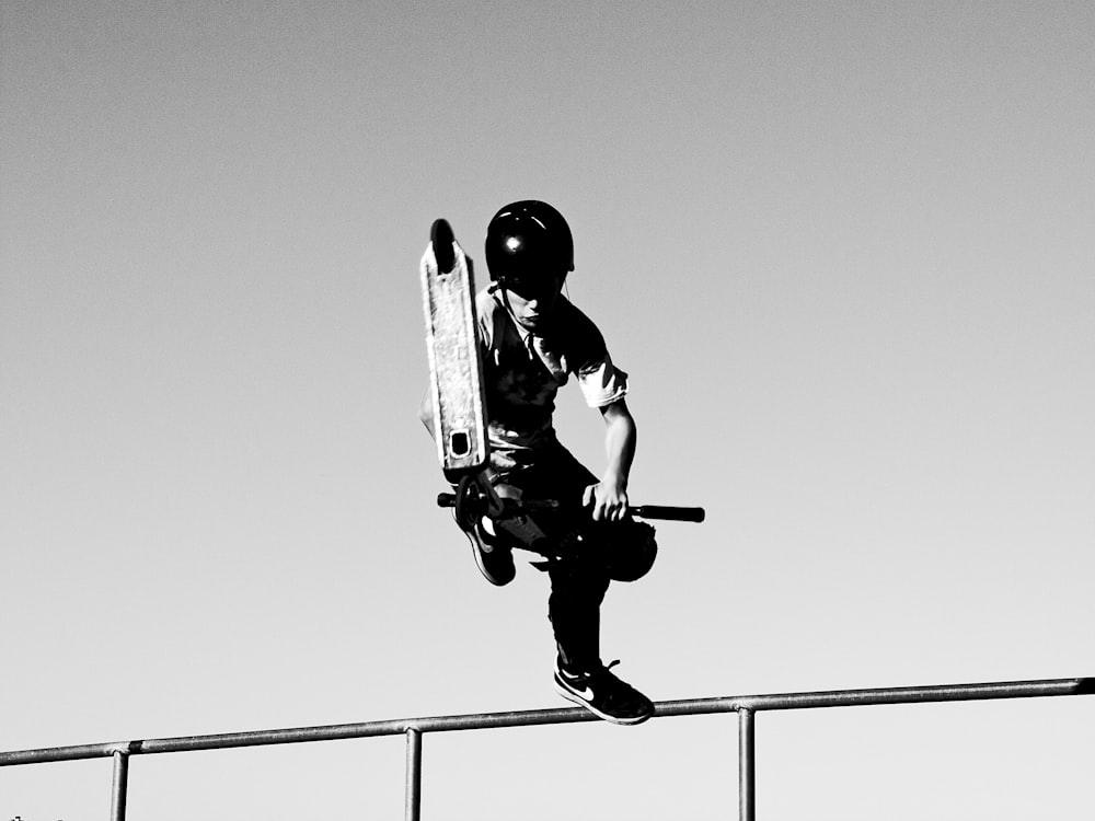 a skateboarder doing a trick in the air