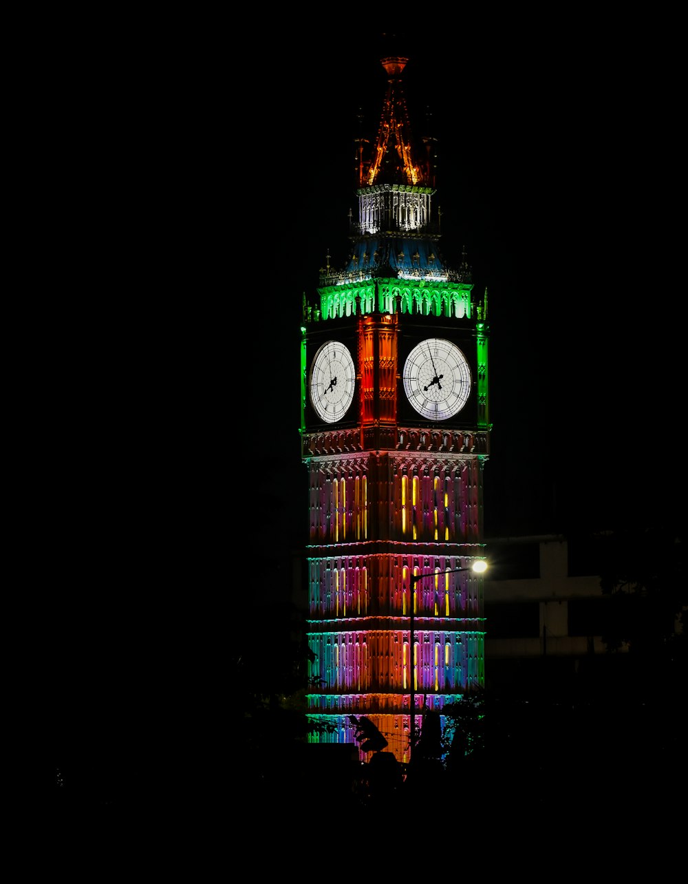 the big ben clock tower lit up at night