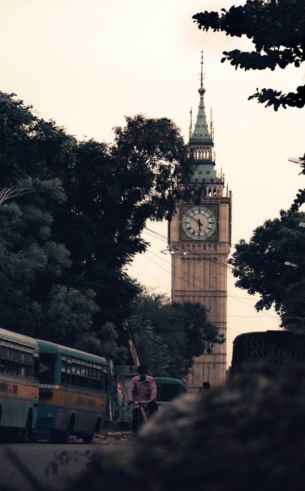 a large clock tower towering over a city