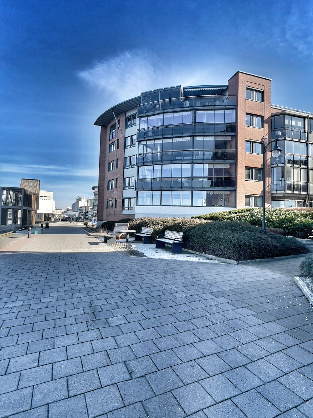 a large building with a lot of windows on the side of it