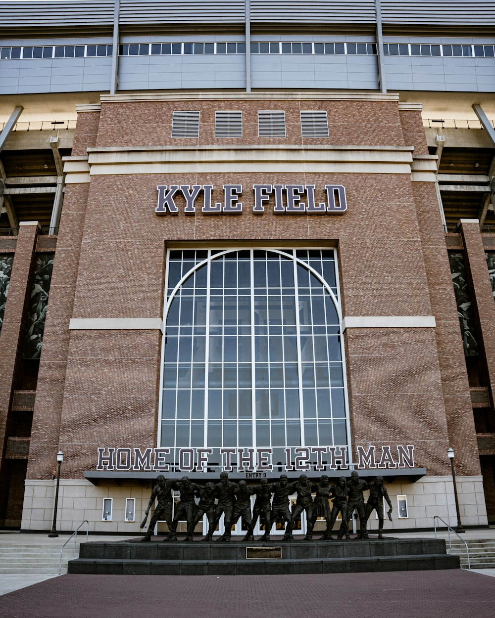 a large brick building with a sign on the front of it