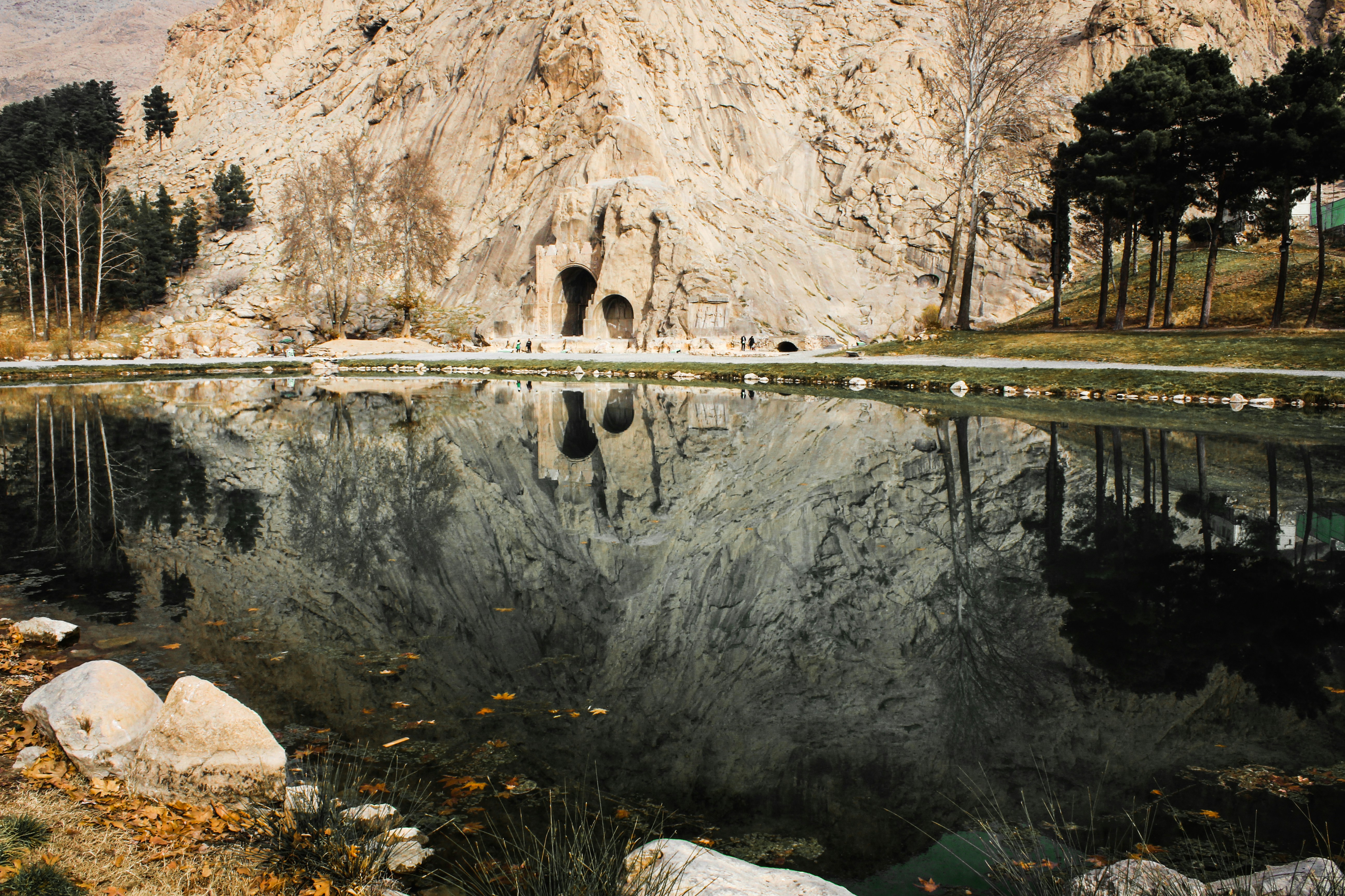 a mountain lake surrounded by trees and rocks
