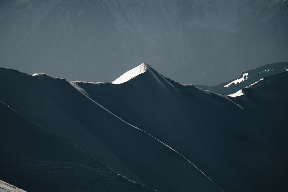 a person skiing down a snow covered mountain