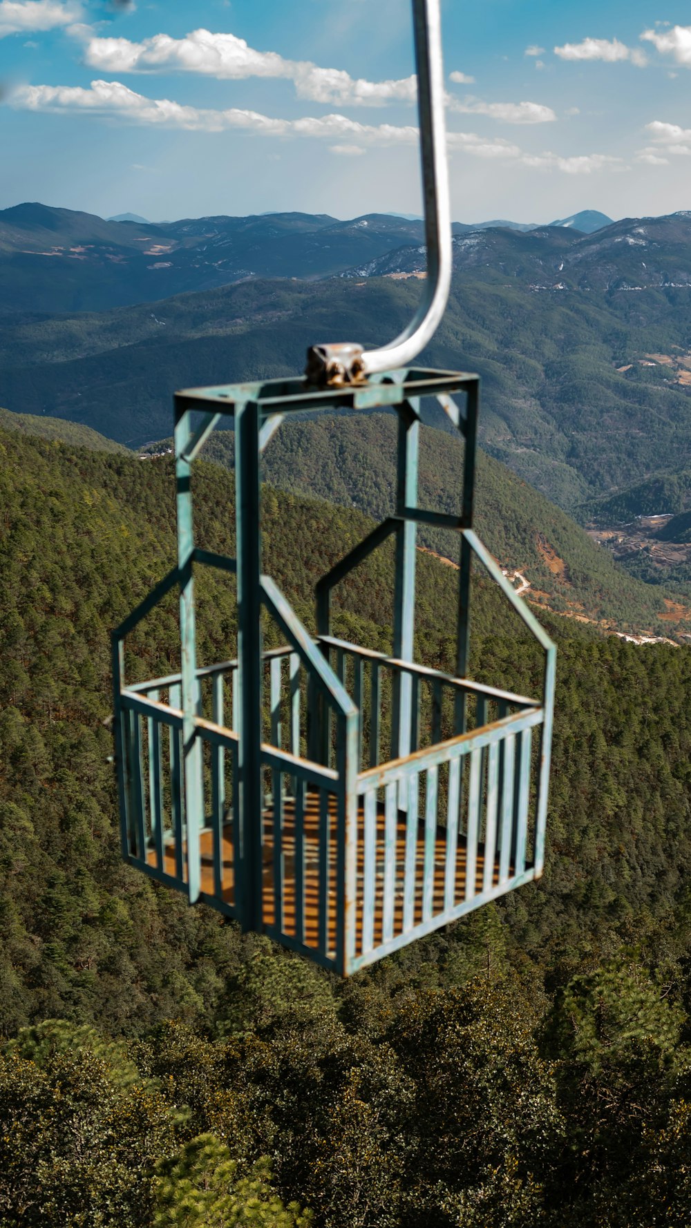 a view of the mountains from the top of a mountain