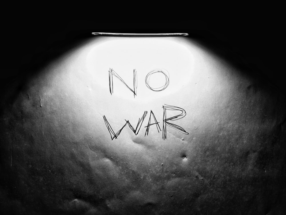 a black and white photo with the words no war written on it