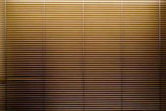 the blinds are closed in the room