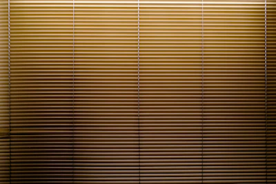 the blinds are closed in the room