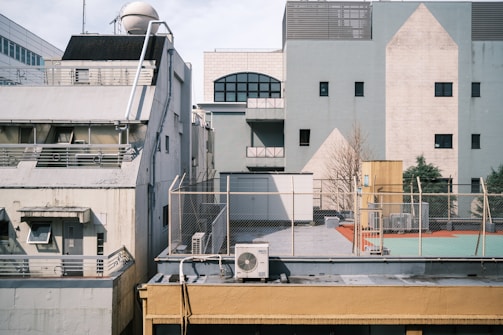 A rooftop view showing clean lines and earthy tones on a commercial building.
