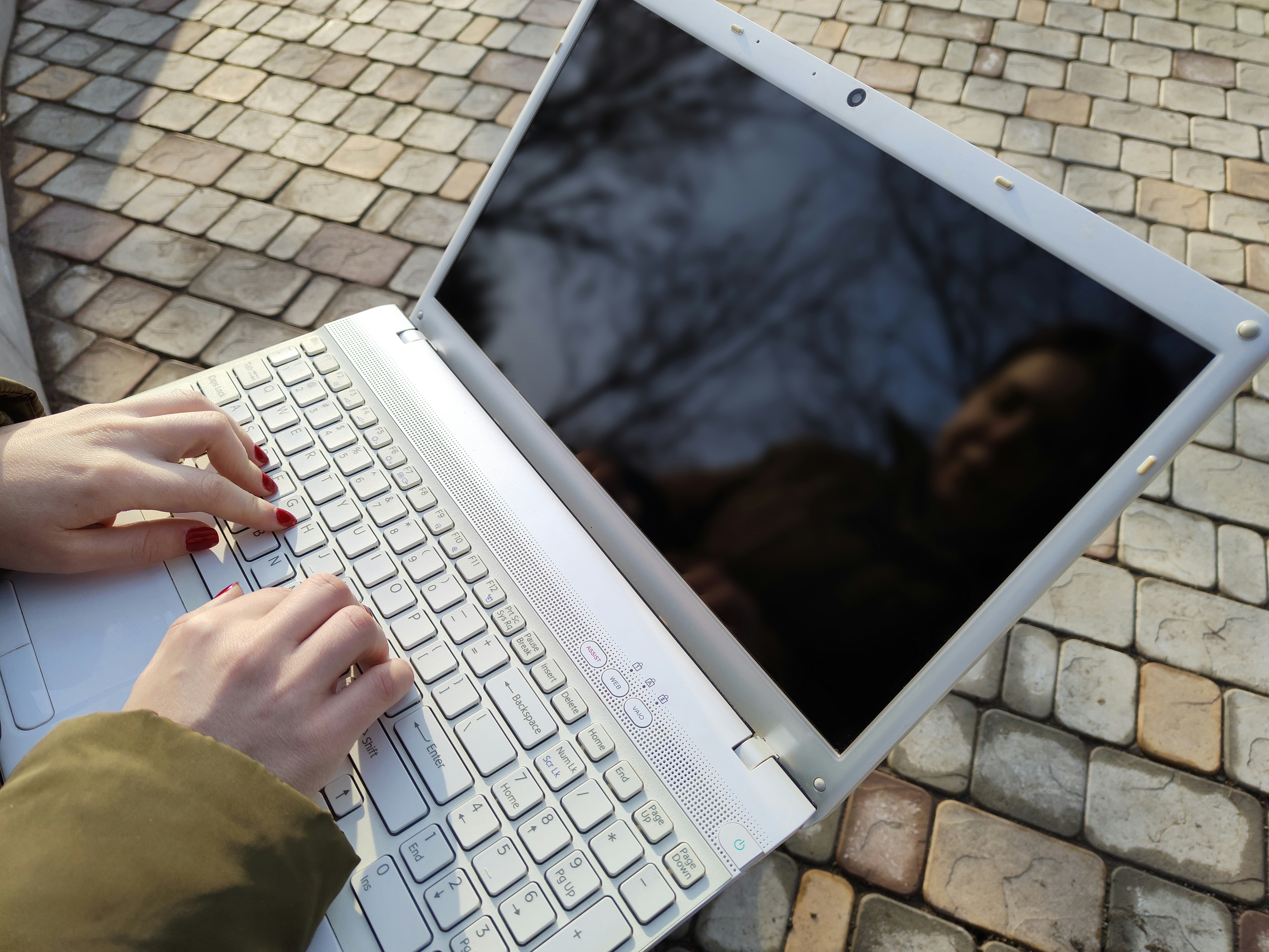 A person using a laptop to search for addiction treatment - Substance abuse counseling