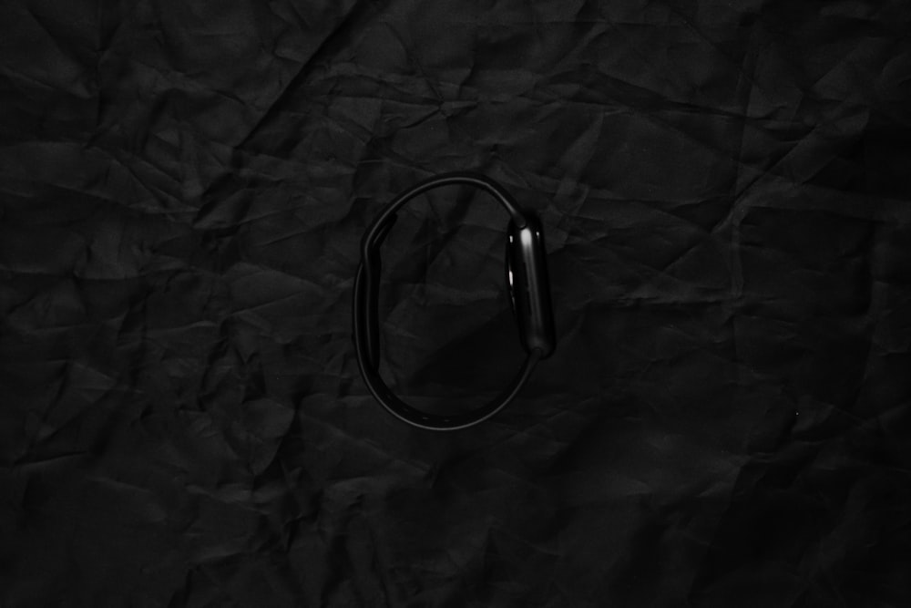 a pair of headphones on a black background