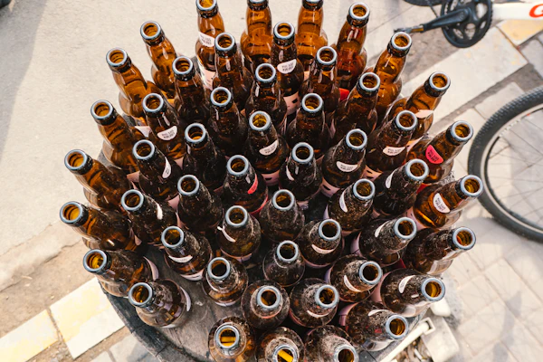 Beer bottles stacked at a craft brewery bottling line