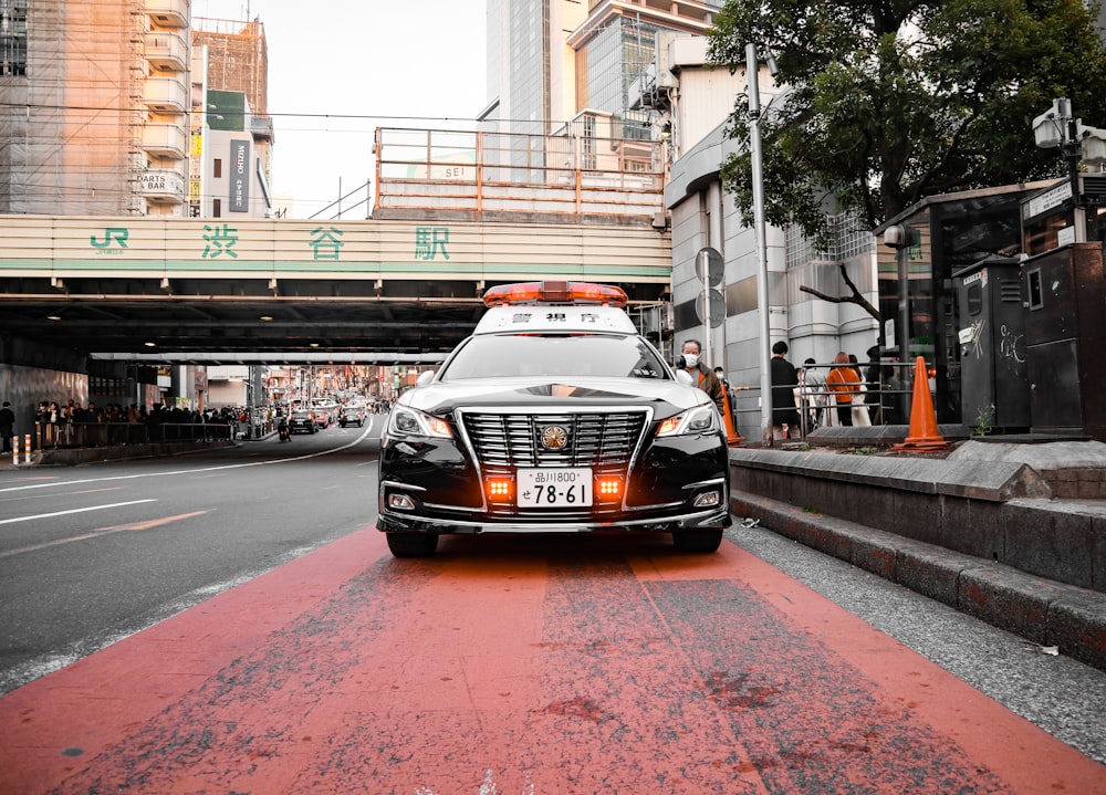 a police car parked on the side of the road