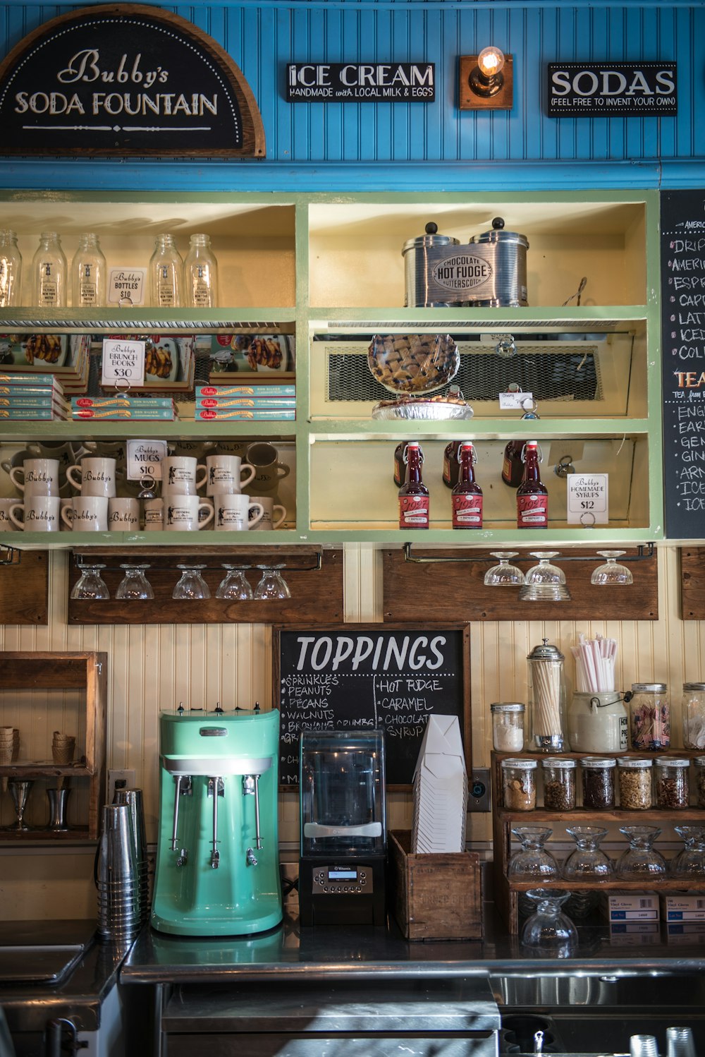 a coffee shop filled with lots of different types of coffee