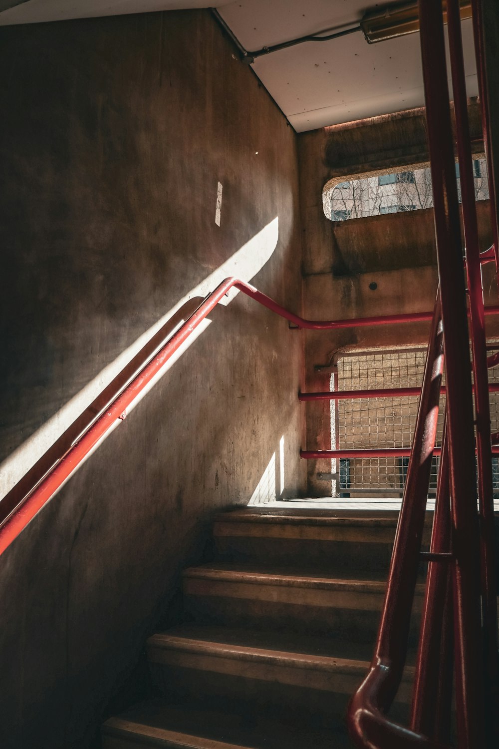 a set of stairs leading up to a window