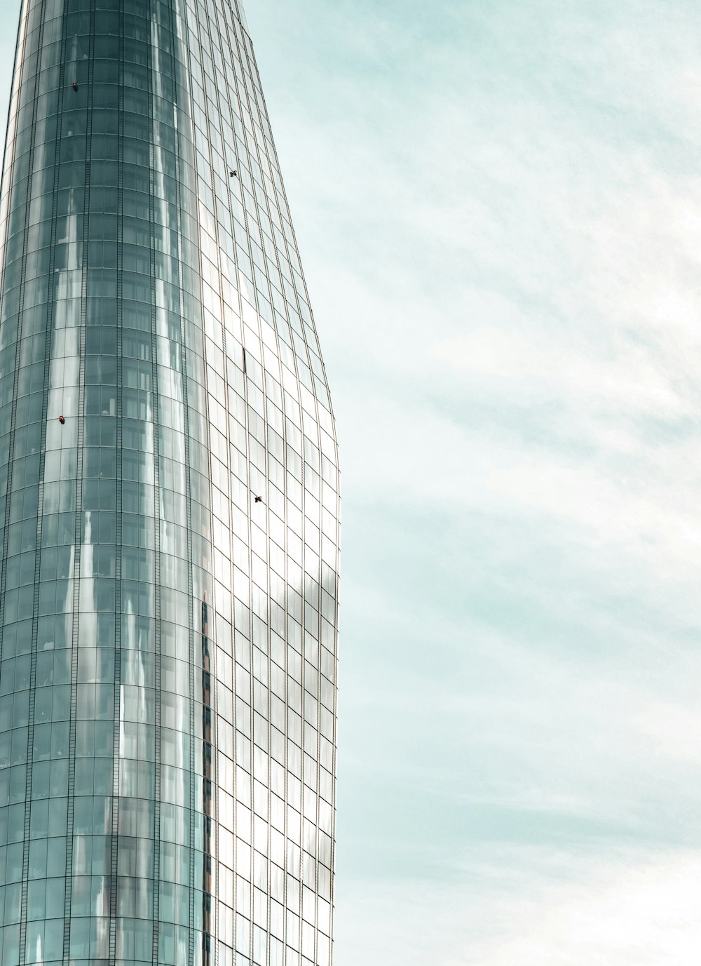 a large tall tower with a sky background