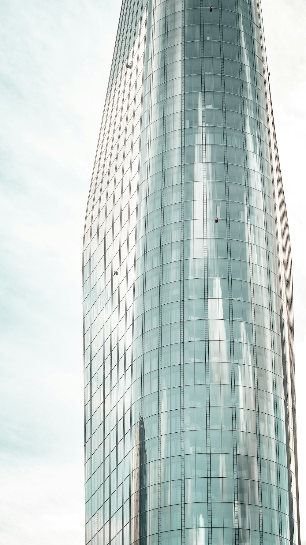 a large tall tower with a sky background