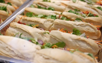 a close up of a tray of sandwiches