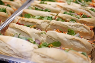 a close up of a tray of sandwiches