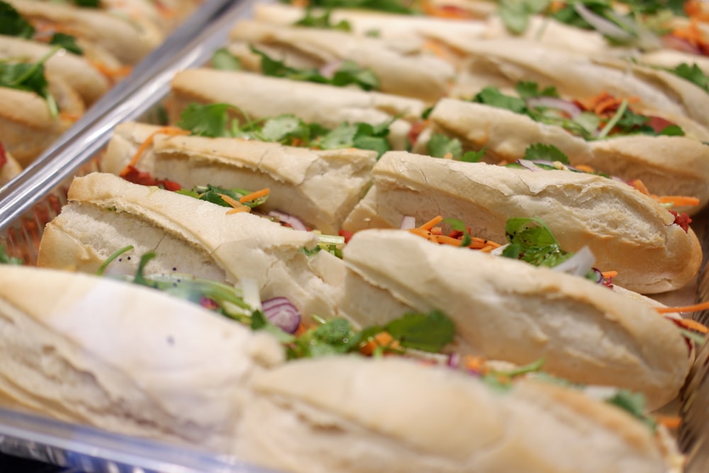 a close up of a tray of sandwiches