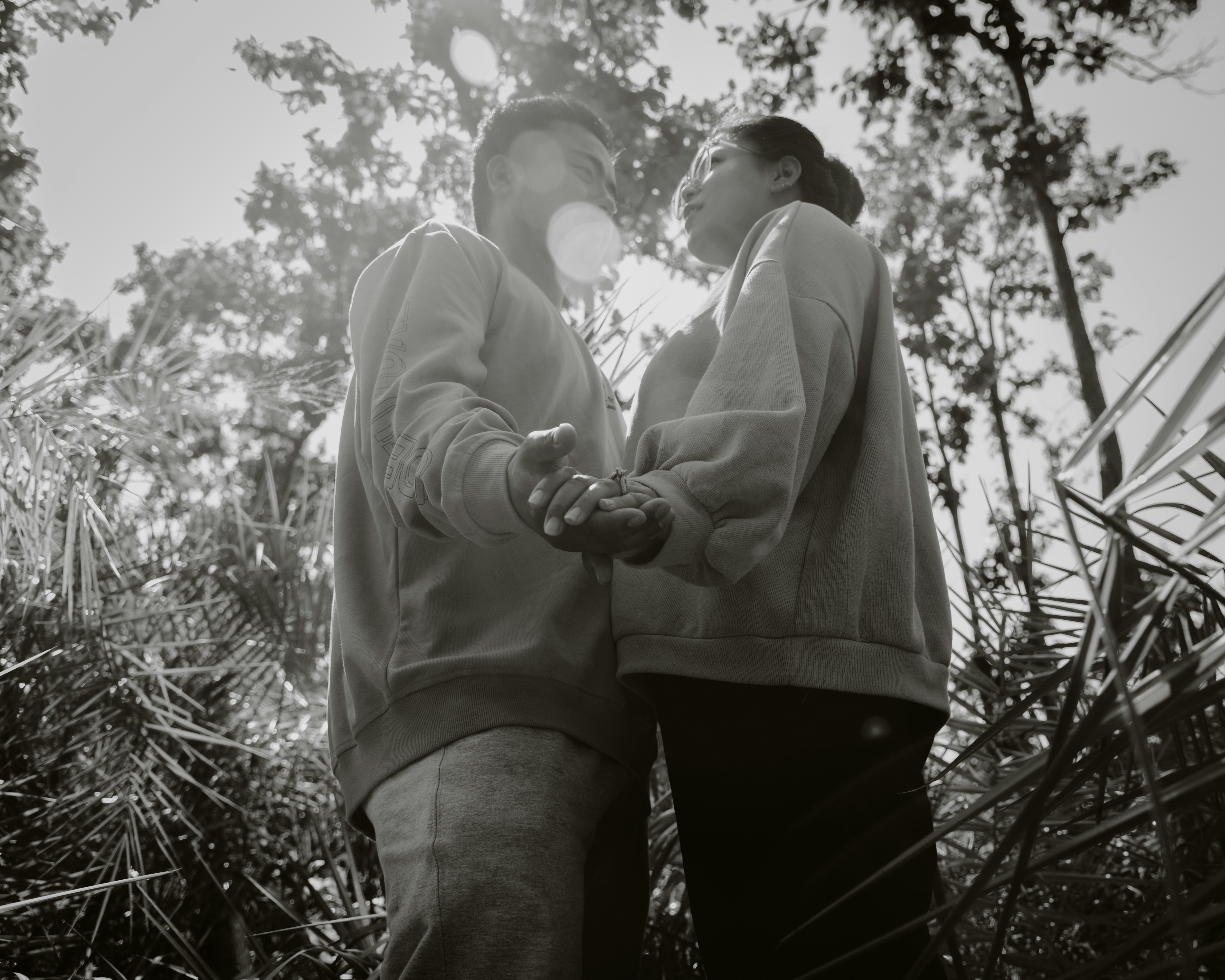 a couple of people standing next to each other