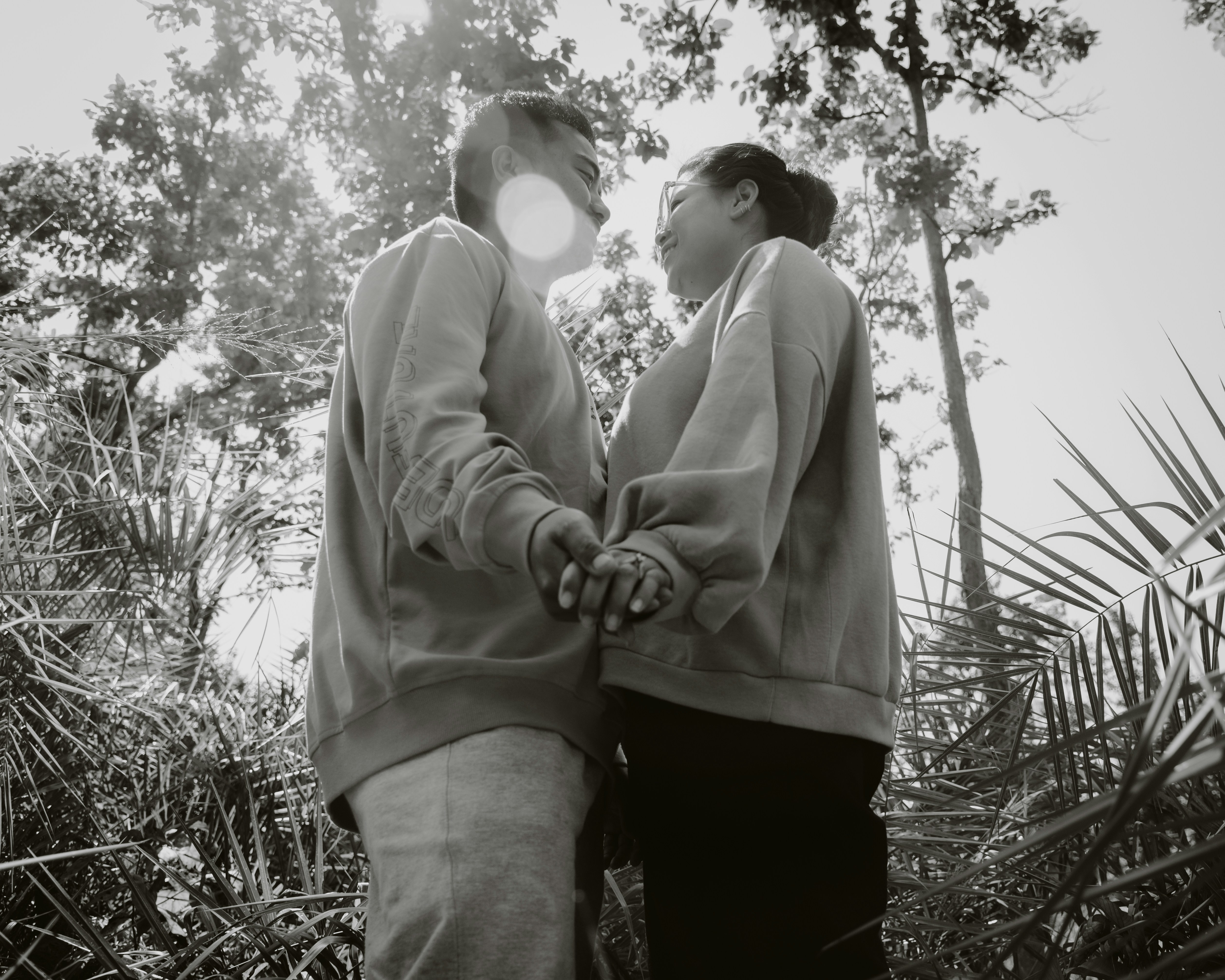 a couple of people standing next to each other